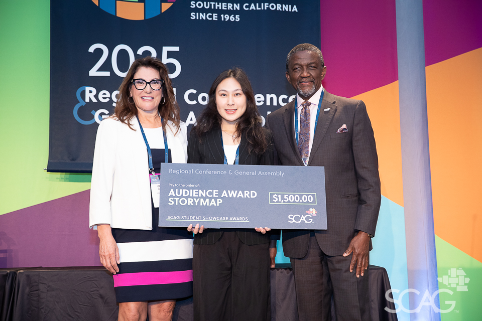 Cindy Allen and Kome Ajise with a Student Showcase winner.