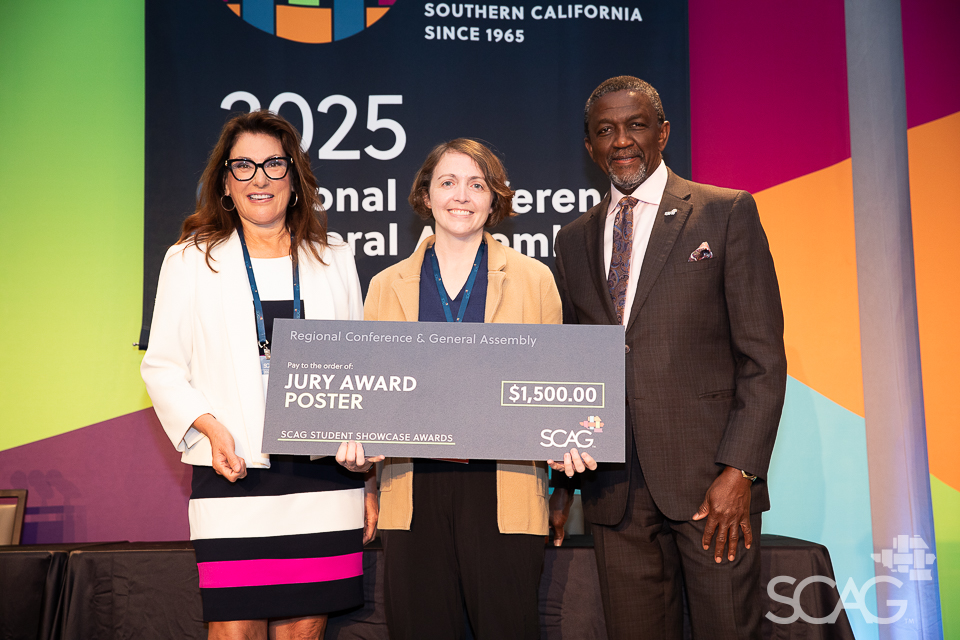 Cindy Allen and Kome Ajise with a Student Showcase winner.